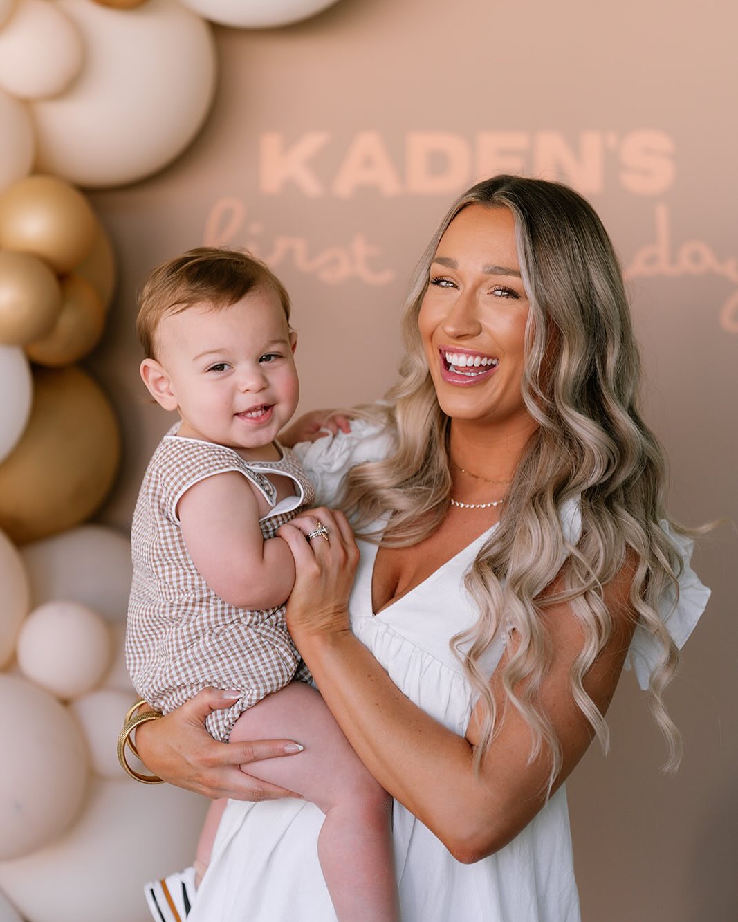 Ashley Boston holding her son